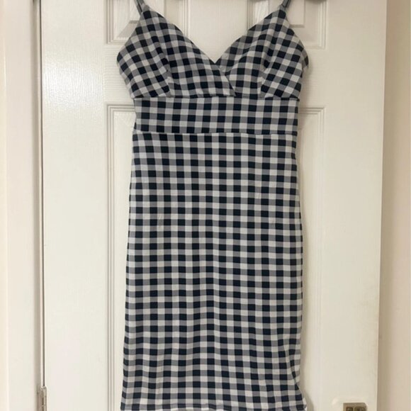 Dresses & Skirts - chequered black v cut mini dress